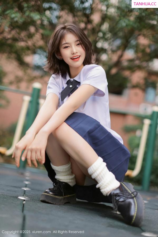   [XiuRen]高清写真图 2025.03.07 No.9985 小橘子orange 美腿性感第16张图片